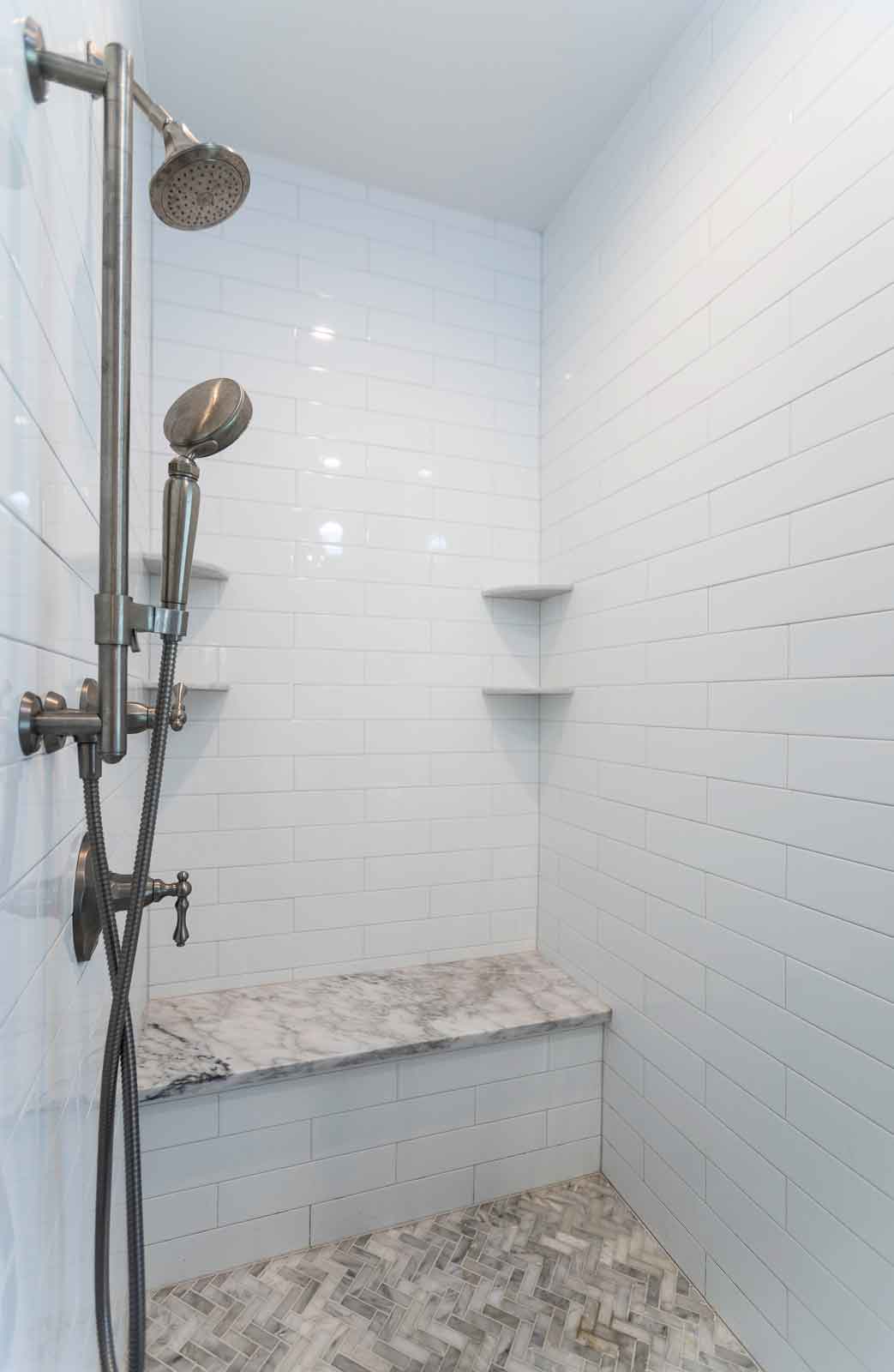Bathroom shower with seat and detachable shower nozzle