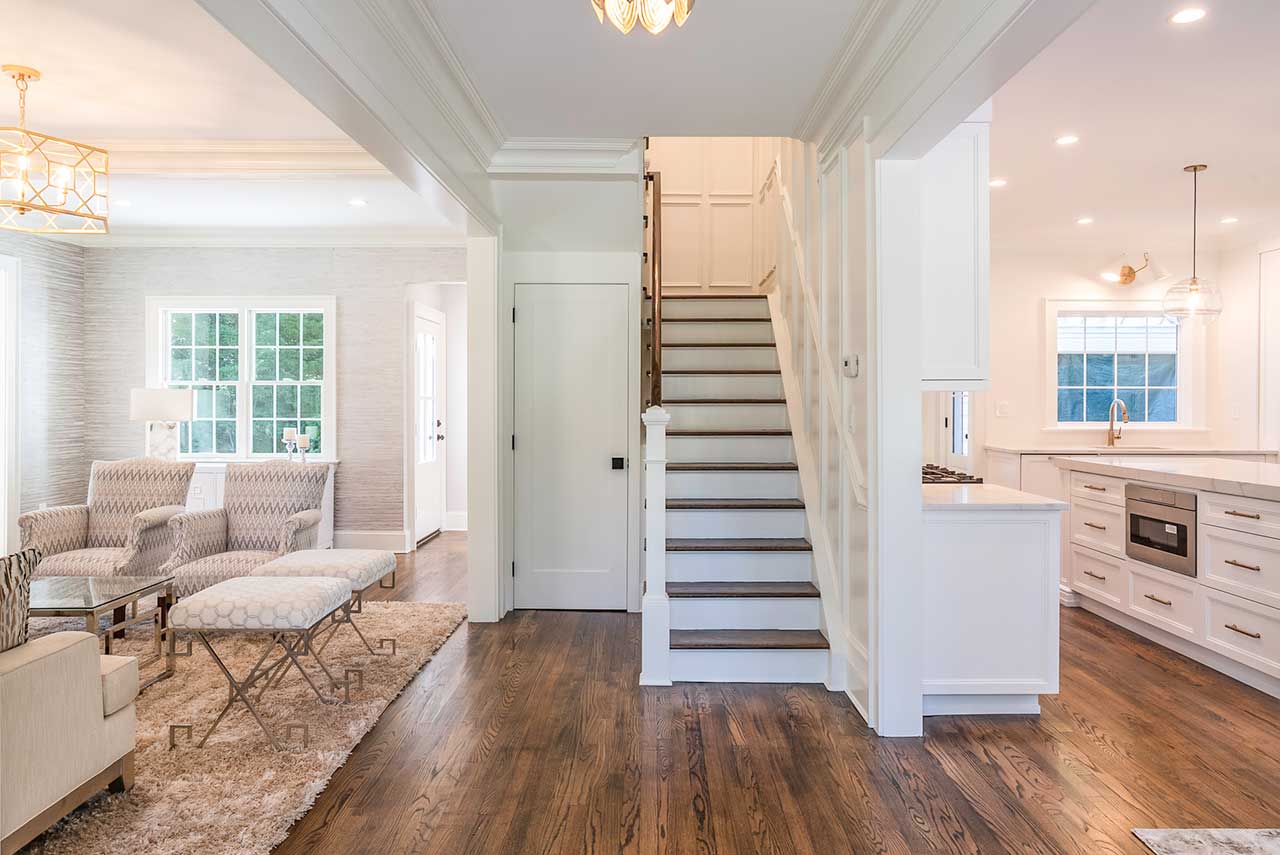 Plandome-staircase-livingroom-kitchen-open-space
